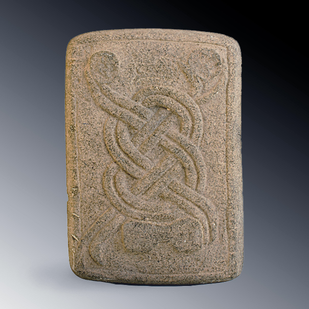 A spiraled metate