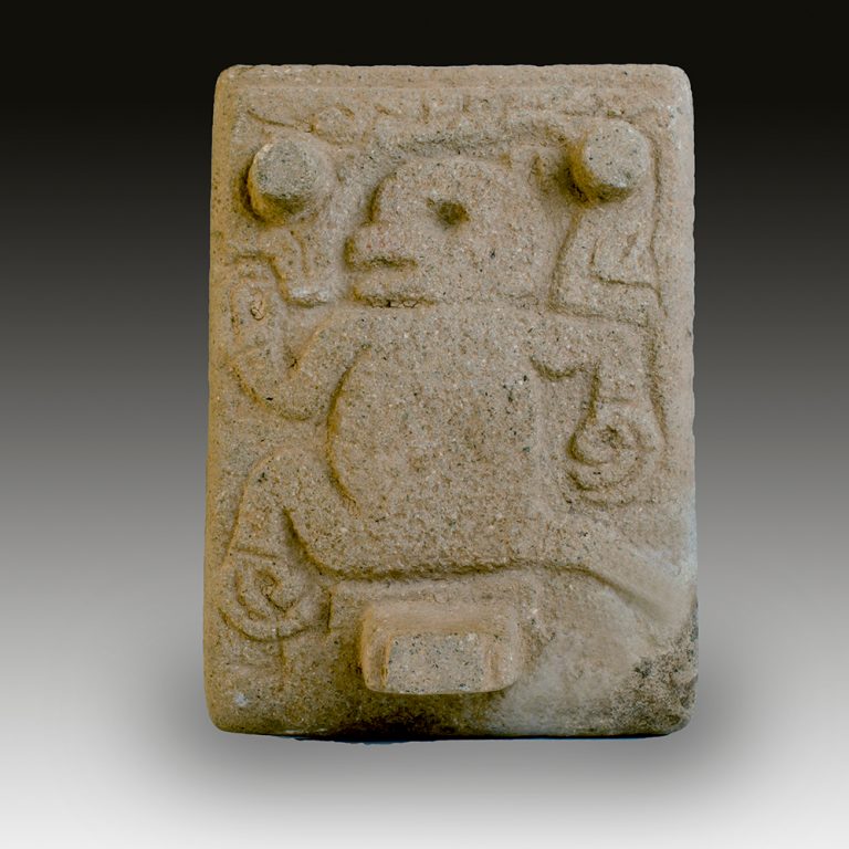 A Mixtec metate with a monkey
