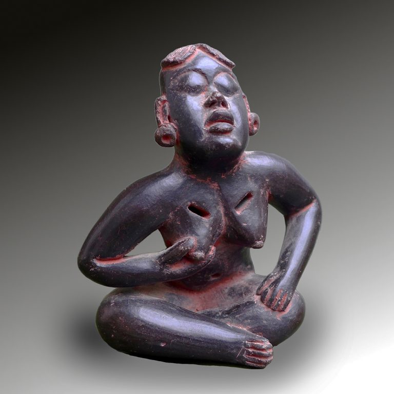 An Olmec sitting lady