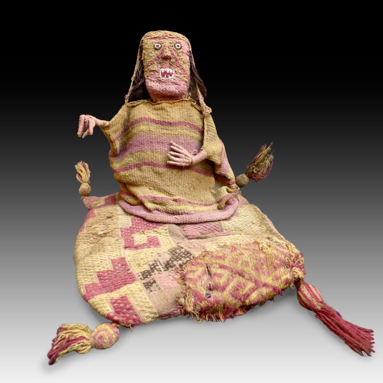 A rare Chancay textile figure